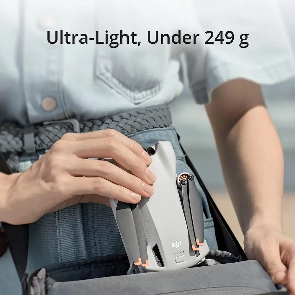 Open Box DJI Mini 3 - Lightweight and Foldable Mini Camera Drone with 4K HDR Video, 38-Min Flight Time, True Vertical Shooting, and ligent Features