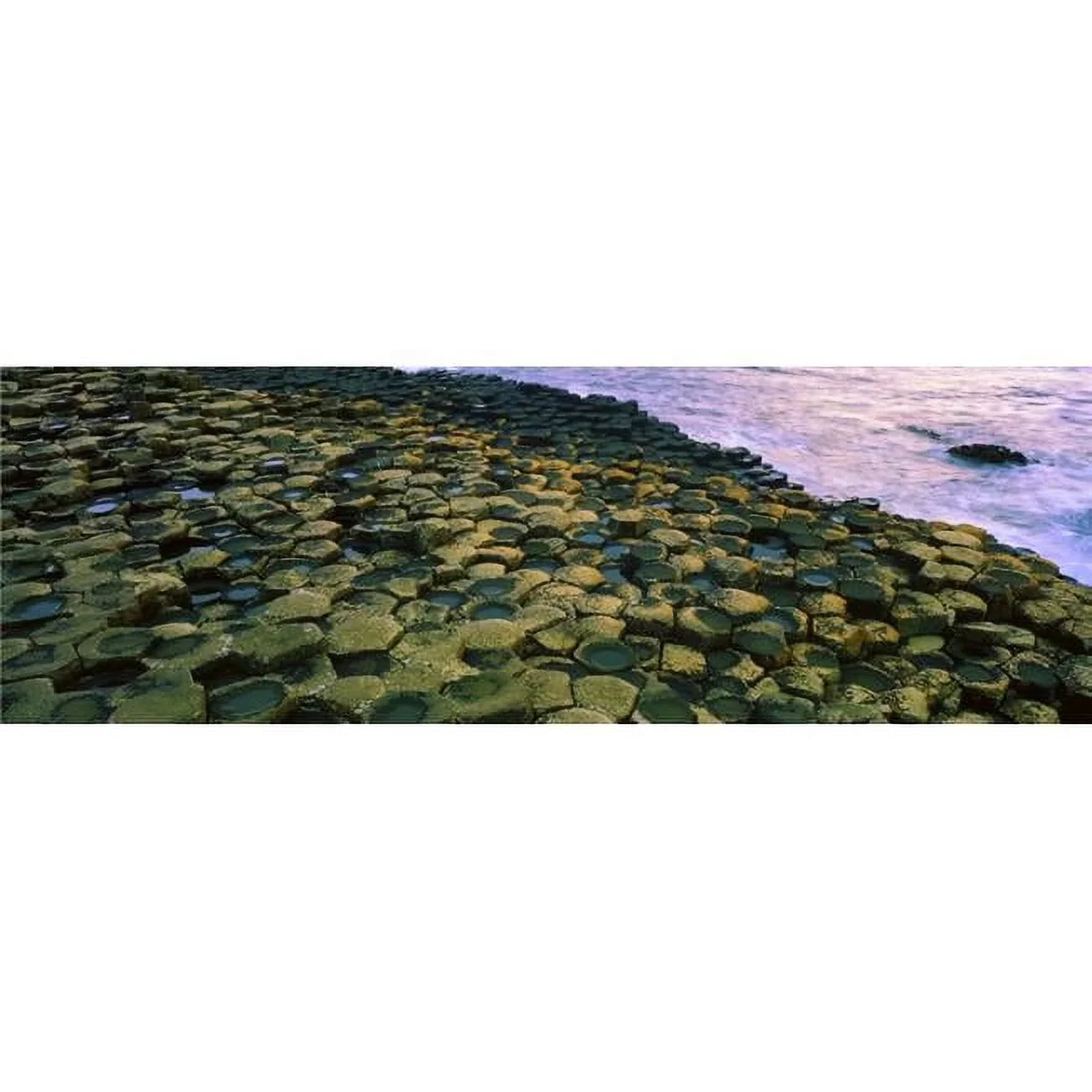 Giants Causeway Co Antrim Ireland - Area Designated A Unesco World Heritage Site with Basalt Columns Poster Print by The Irish Image Collection - 34 x 11